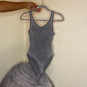 Grey body suit
